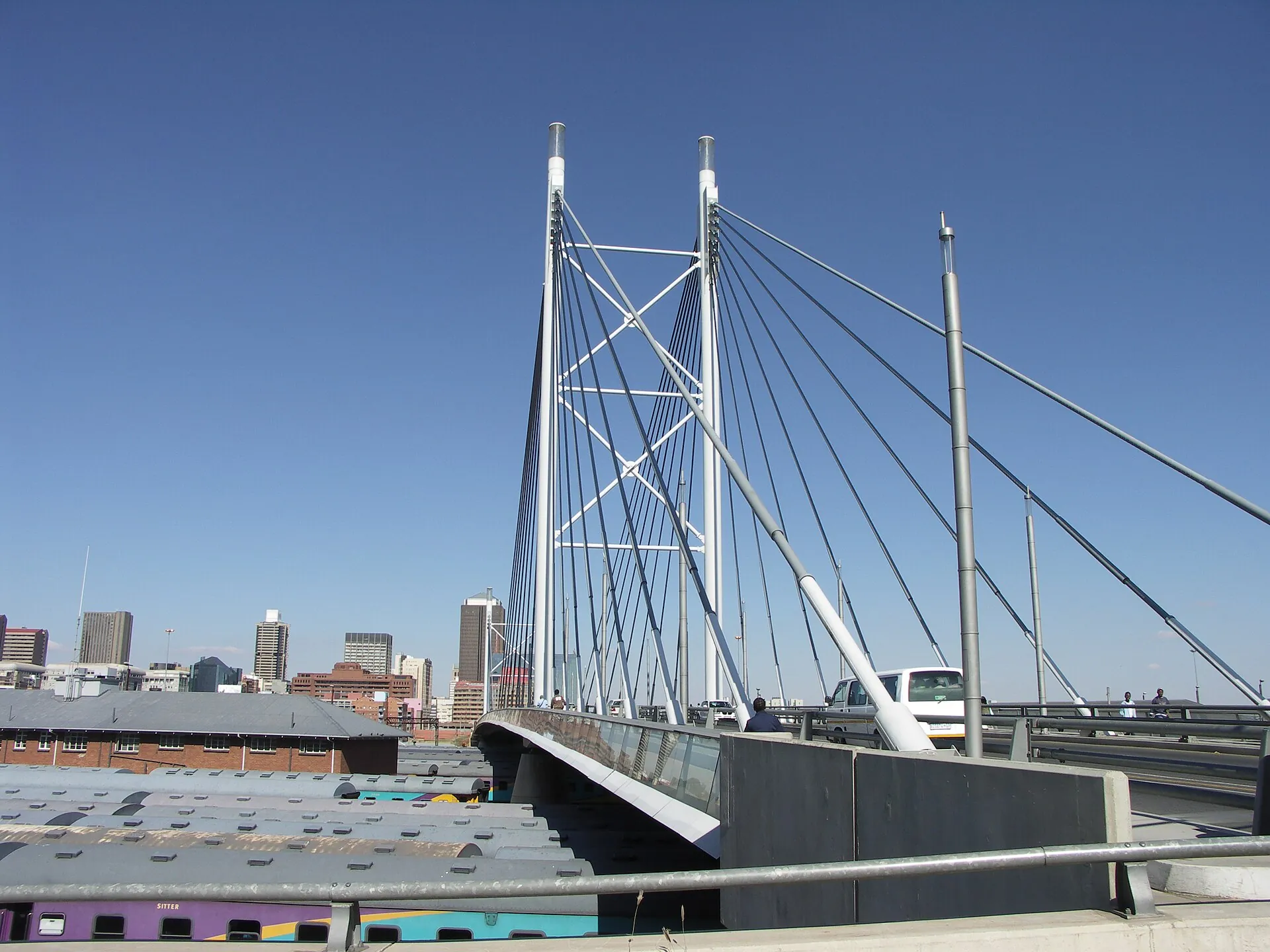 The Nelson Mandela Bridge with the Johannesburg skyline